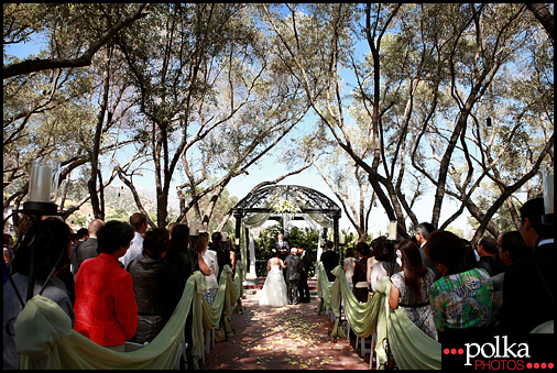 The ceremony location resembles an enchanted forest wedding ceremony 